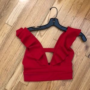 Crop top with ruffle sleeves and caged back